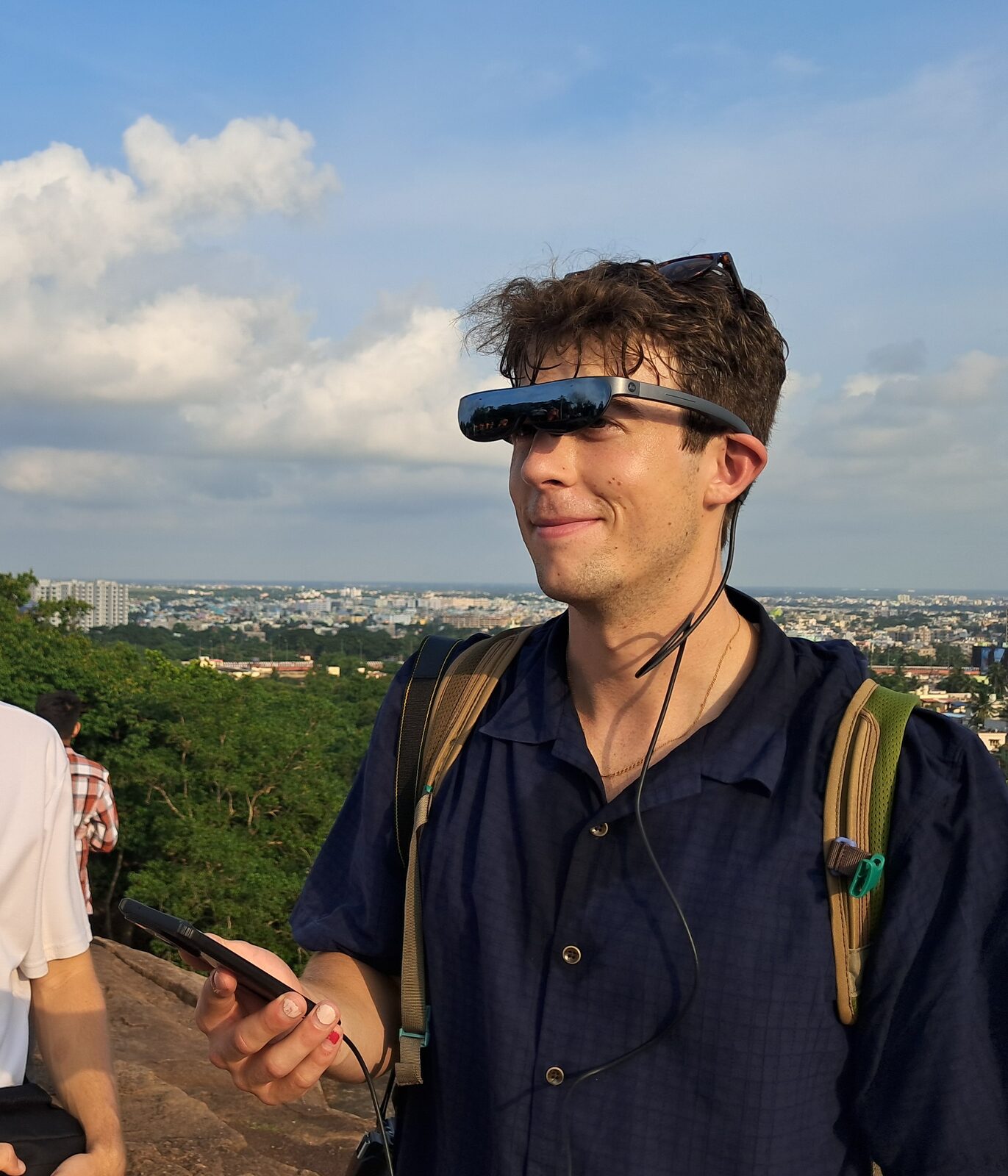 Visitor wearing AR glasses outdoors