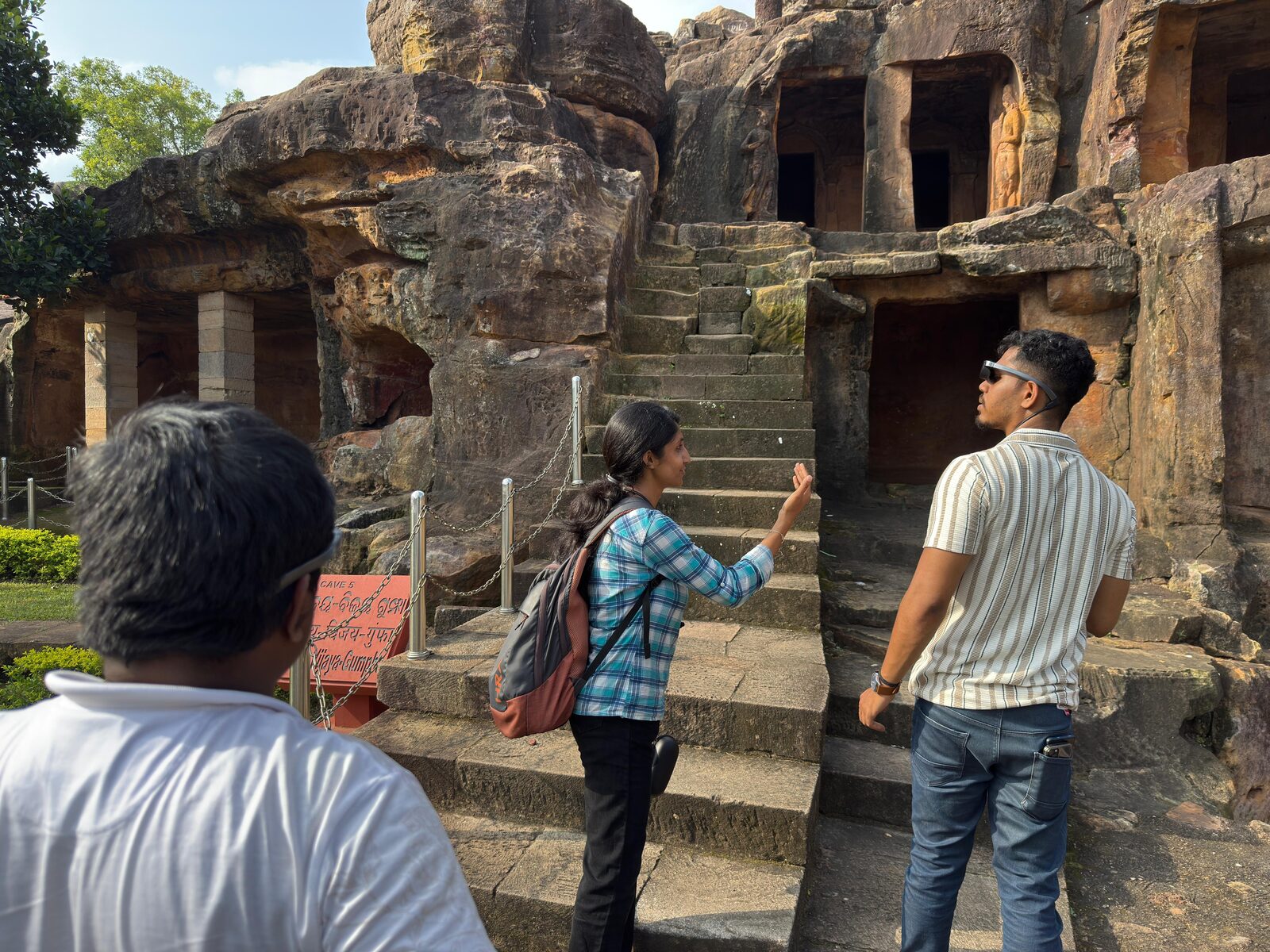 Visitors experiencing AR at Khandagiri-Udayagiri caves