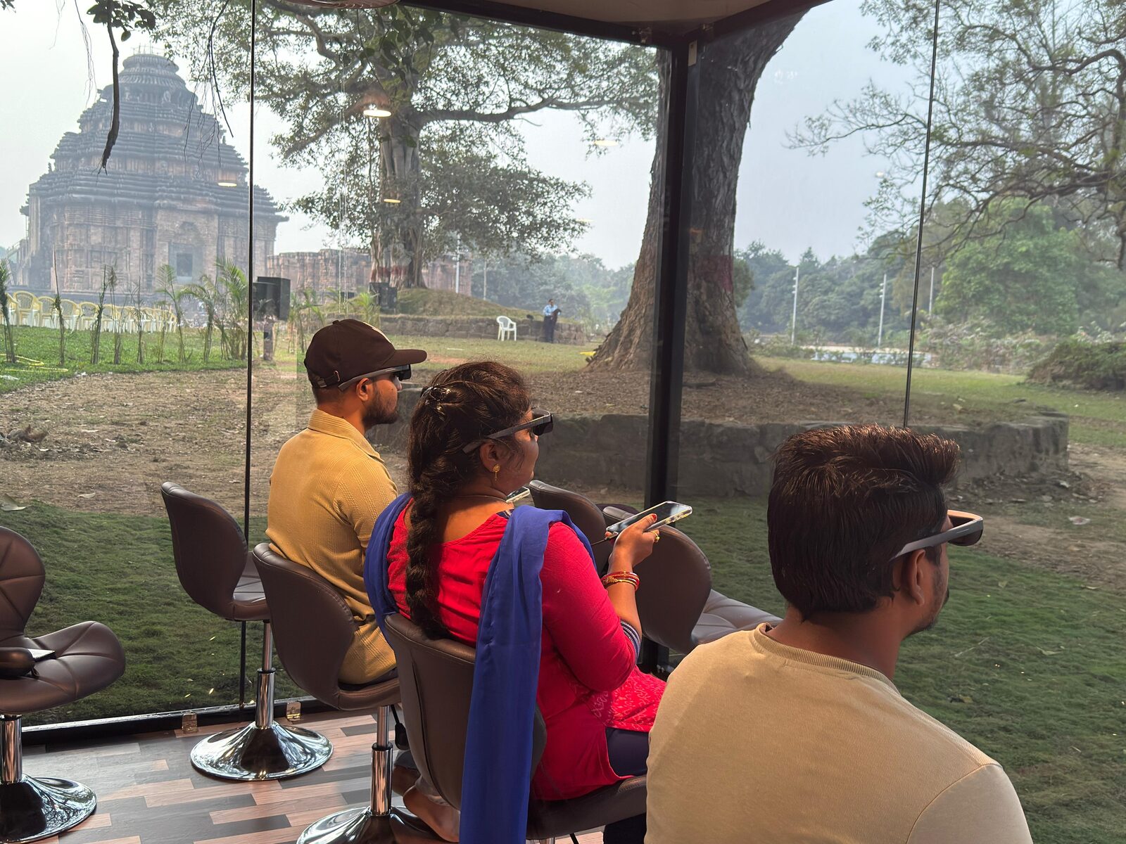 Visitors trying AR glasses at AR-o-VR booth