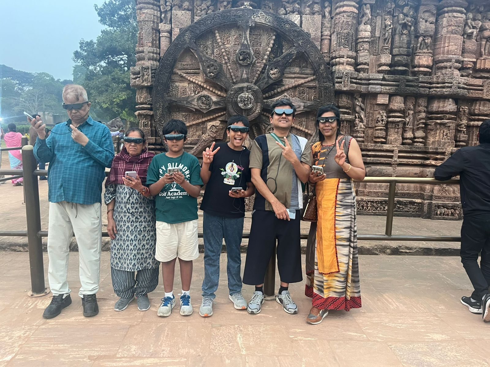 Group with AR glasses at Konark wheel carving