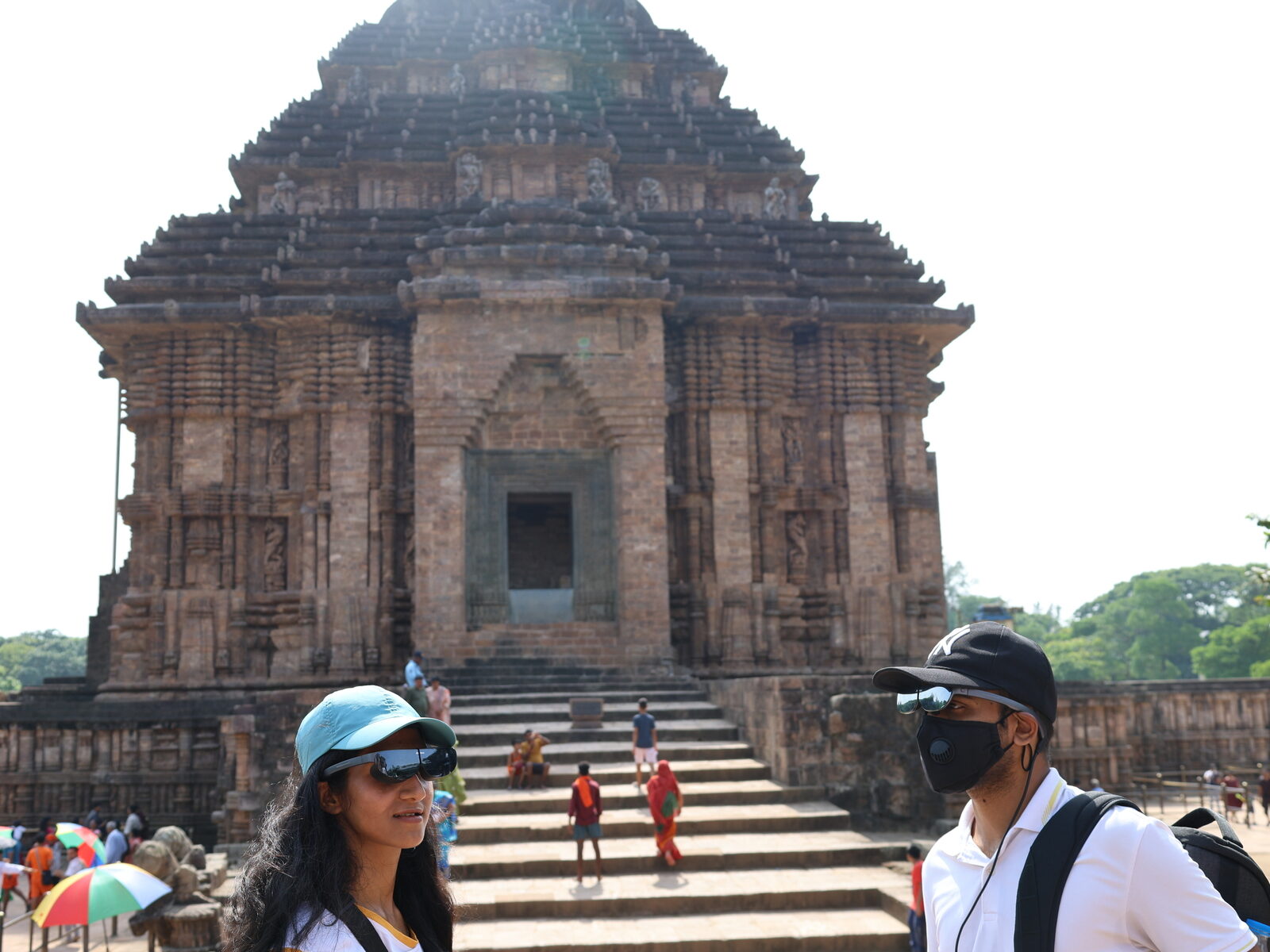Two visitors with AR glasses at Konark temple