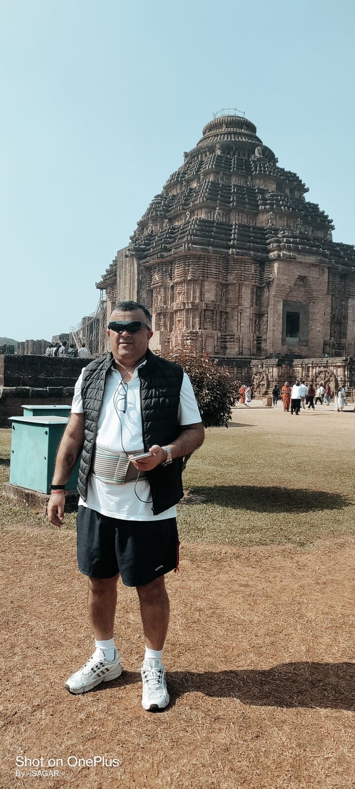 Visitor wearing AR glasses at Konark temple