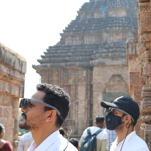 Two visitors on AR tour at Konark Sun Temple